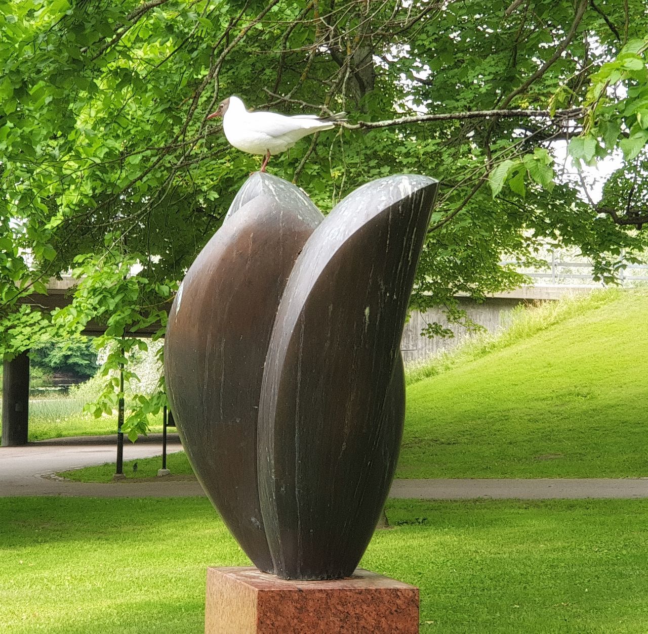 sculpture, plant, tree, grass, statue, green, nature, day, no people, lawn, park, park - man made space, art, garden, growth, bird, outdoors, monument