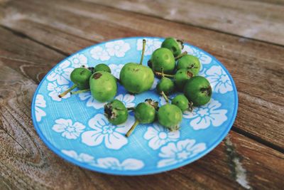 Close-up of fruits in plate on table
