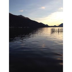 Reflection of clouds in water at sunset