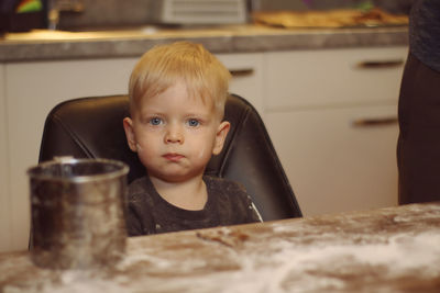 Portrait of cute boy at home