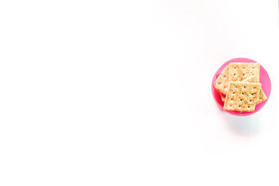 Close-up of cake against white background
