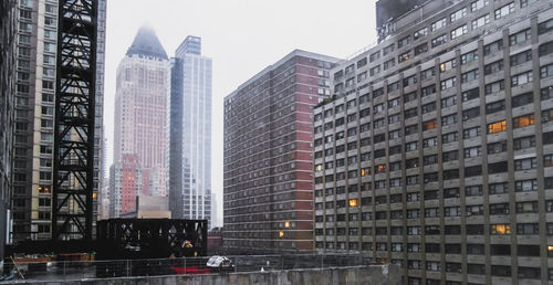 Low angle view of skyscrapers in city