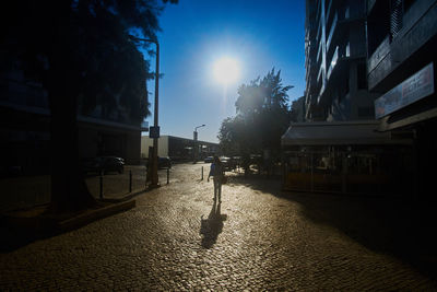 Street in city against sky