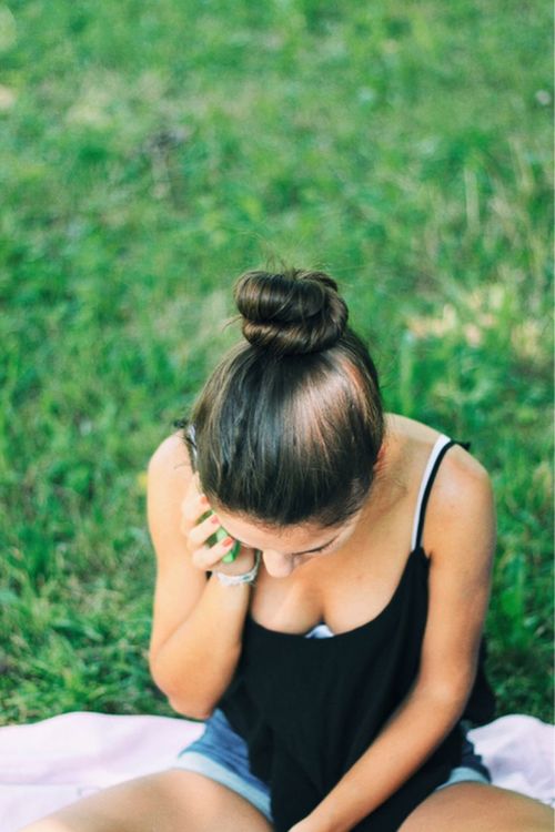 lifestyles, young women, leisure activity, long hair, focus on foreground, young adult, person, headshot, grass, brown hair, blond hair, casual clothing, waist up, field, relaxation, rear view, day