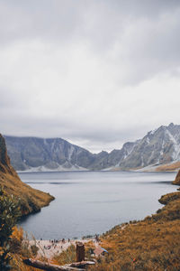 Scenic view of lake and mountains against sky