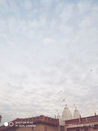 Low angle view of buildings in town