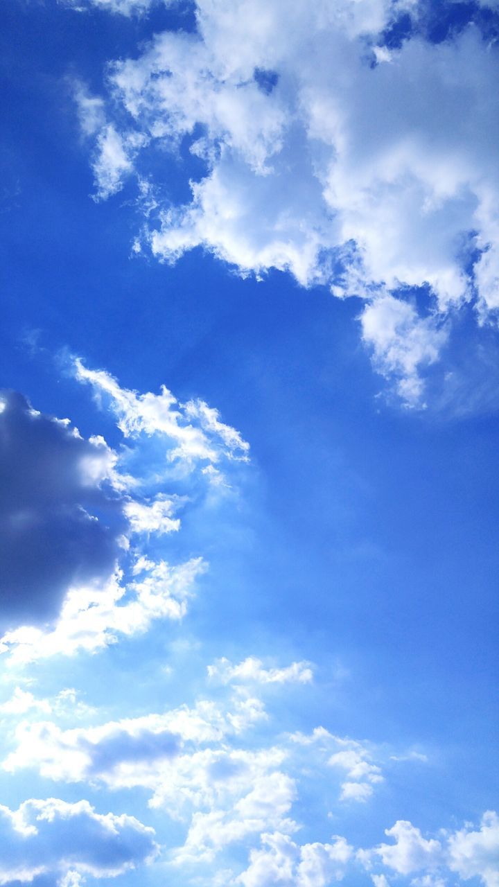 sky, beauty in nature, cloud - sky, nature, low angle view, scenics, backgrounds, tranquility, no people, sky only, blue, day, cloudscape, outdoors, tranquil scene, full frame