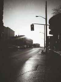 Road in city against sky