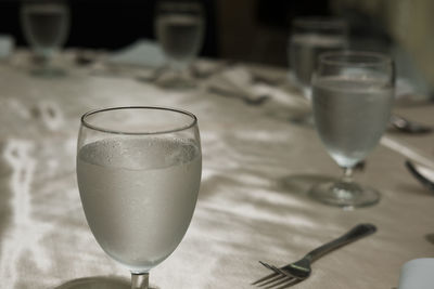 Close-up of beer glass on table