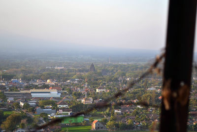 High angle view of buildings in city against clear sky