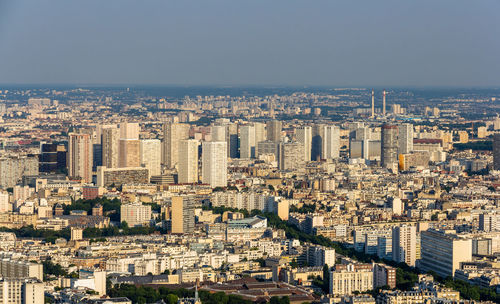 High angle view of buildings in city against clear sky