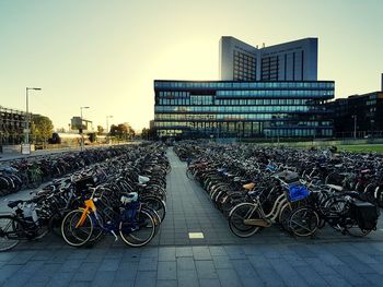 Bicycles parked against building