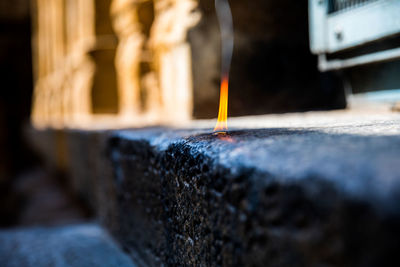 Close-up of burning candles