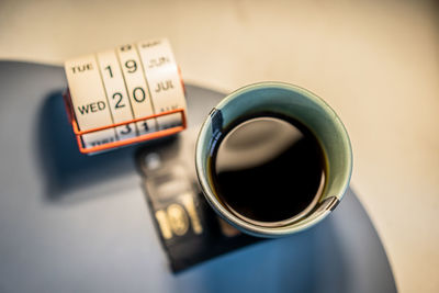 Close-up of coffee cup on table