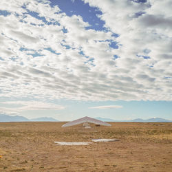 Scenic view of desert against sky