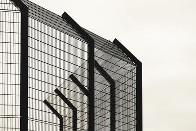 Low angle view of modern building against clear sky