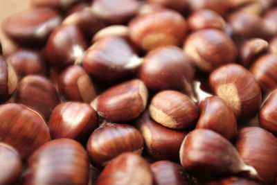 Full frame shot of brown chestnuts at store