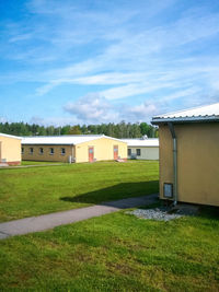 House on field against sky