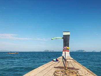 Scenic view of sea against blue sky