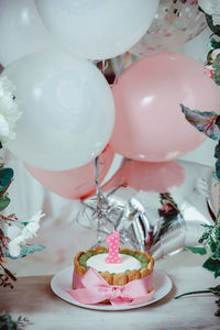 High angle view of pink balloons on table