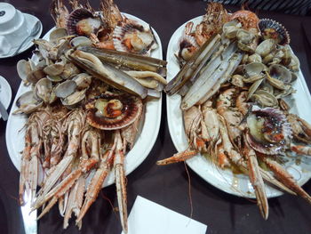 Directly above shot of seafood in bowls on table