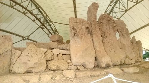 Low angle view of stone wall