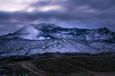 Panoramic view of volcanic mountain against sky