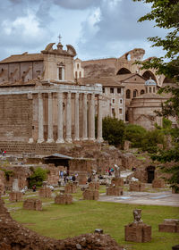 Old ruins of temple against cloudy sky