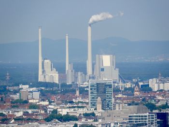 Buildings in city against sky