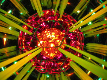 Low angle view of illuminated chandelier