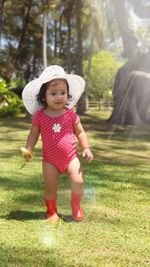 Full length portrait of cute baby girl