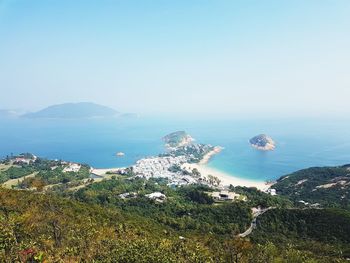 High angle view of bay against clear sky