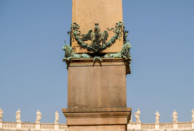 Low angle view of statue against clear sky