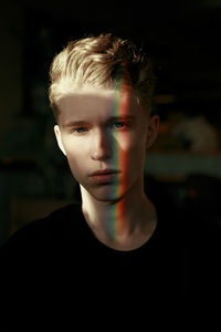 Portrait of man with spectrum on face