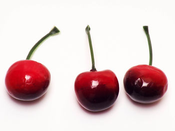 Close-up of fruits against white background