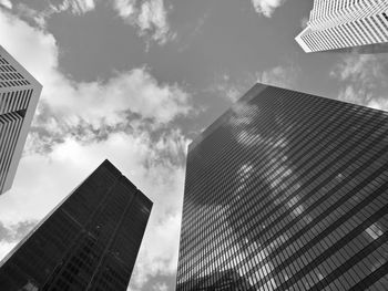 Low angle view of modern buildings against sky