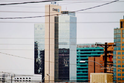 Low angle view of modern buildings against clear sky