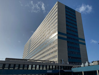 Low angle view of modern building against sky