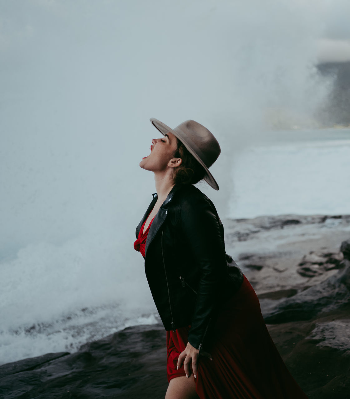 hat, clothing, one person, water, sea, leisure activity, lifestyles, real people, beach, standing, young adult, nature, looking, side view, adult, day, young women, land, outdoors, profile view, hairstyle