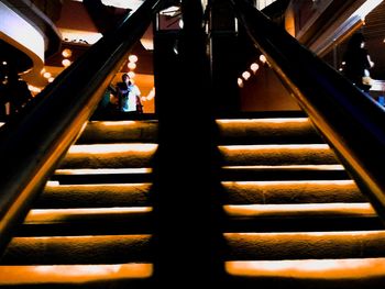 Low angle view of people on stairs