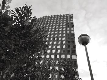 Low angle view of skyscraper against sky