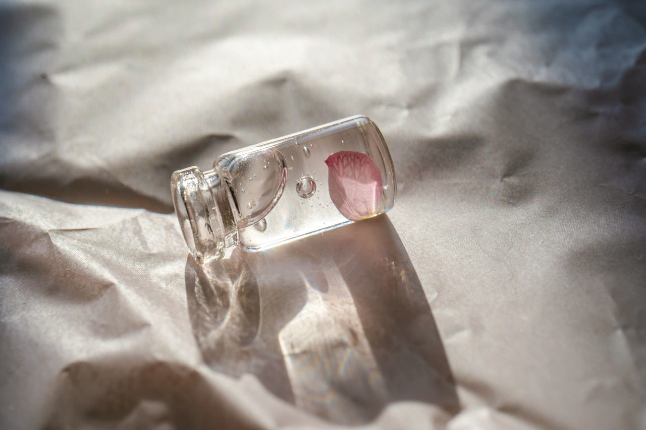 white, indoors, no people, textile, ring, jewellery, close-up, bed, crumpled, wealth, selective focus, jewelry, pink, fashion accessory, wedding, diamond, furniture