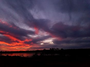 Scenic shot of dramatic sky over calm lake