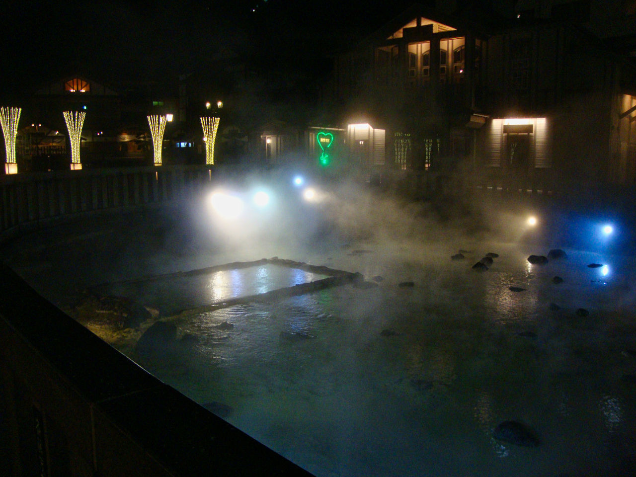 HIGH ANGLE VIEW OF ILLUMINATED LIGHTS IN CITY