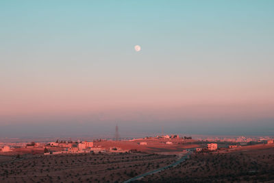 High angle view of townscape against sky at sunset