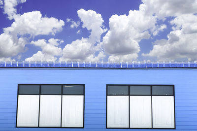 White building against blue sky