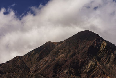 Low angle view of mountain against sky