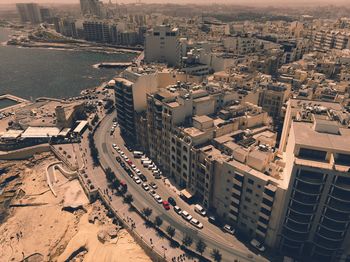 High angle view of street amidst buildings in city