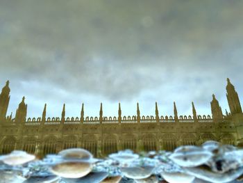 Built structure against cloudy sky