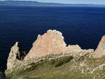 High angle view of rock formation in sea